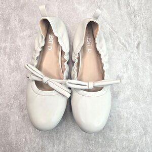 Anthropologie Cream Flats with Knot Accent